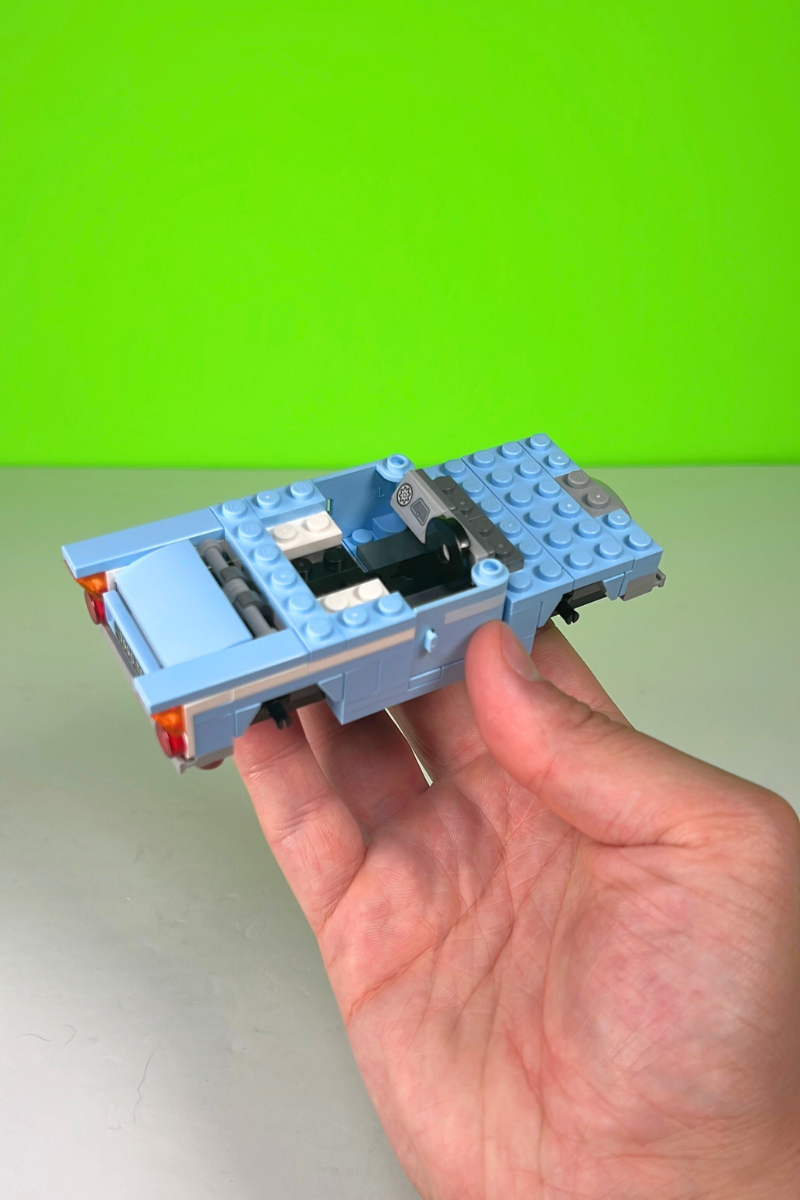 The car without the roof showing the trunk and cabin