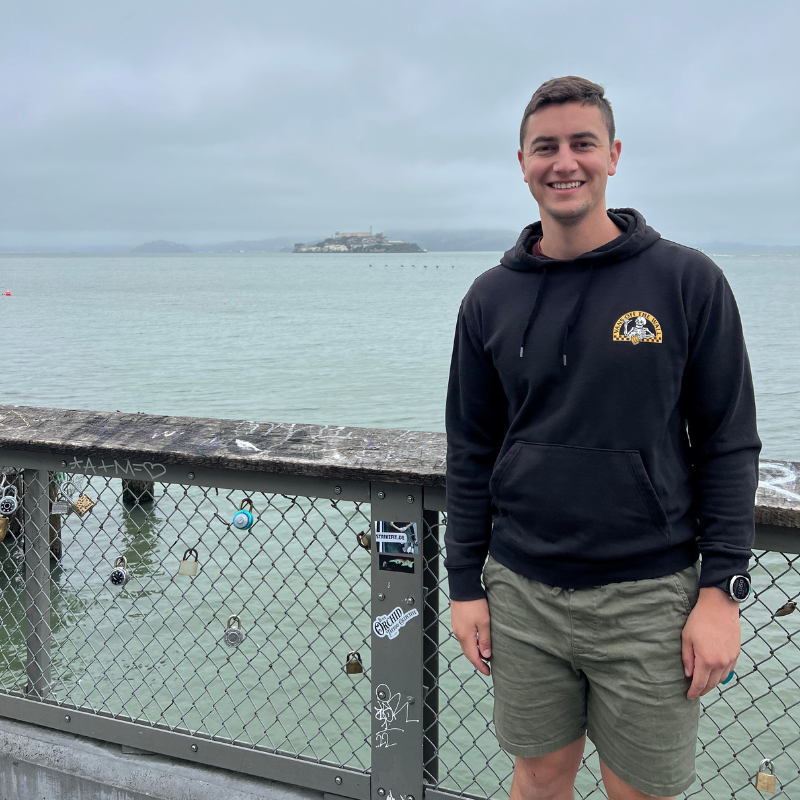 Author of Bricks With Kev posing for a picture in front of the Pacific Ocean.