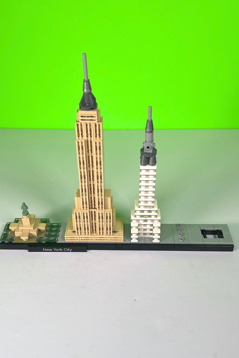 Three LEGO structures on a base plate