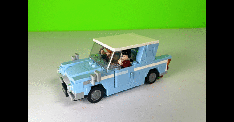 A light blue Ford Anglia built out of LEGO with Ron Weasley and Harry Potter minifigures inside