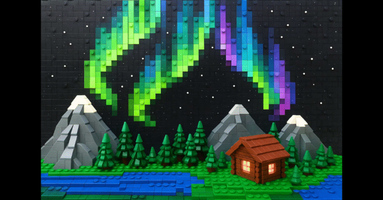 A LEGO diorama of the northern lights and a mountain scene